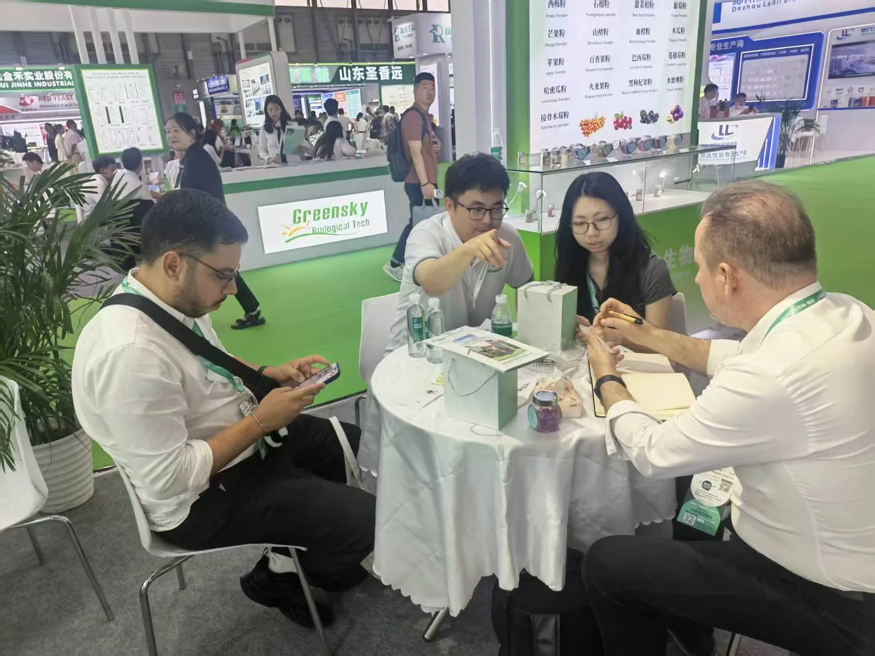 LongBio team discussing botanical ingredient requirements with international buyers