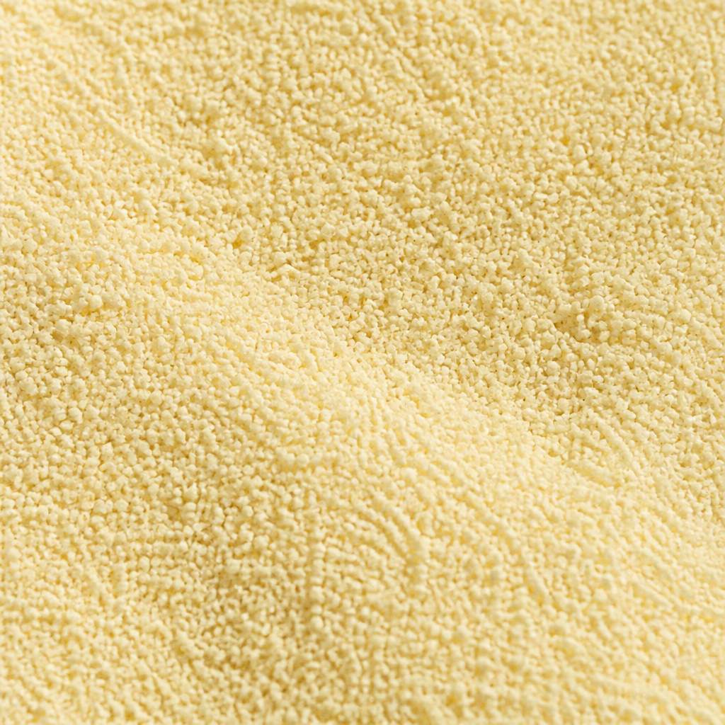 Exceptionally fine uniform pale yellow lycopodium spore powder, macro texture