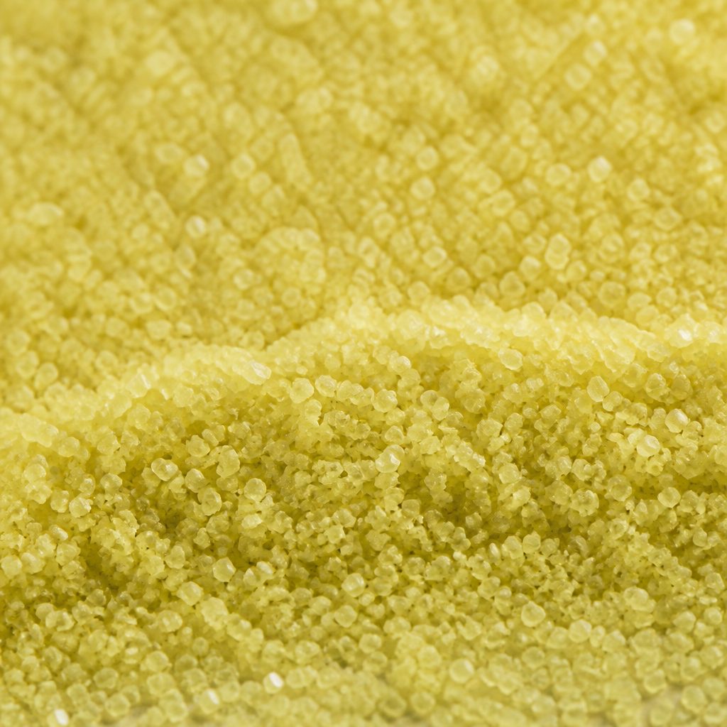 Fine pale yellow pyridoxal-5-phosphate crystals, macro texture