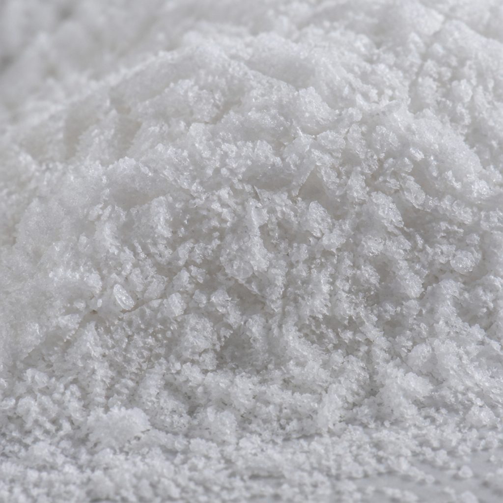 Fine white L-selenomethionine micro-crystals with small plate faces